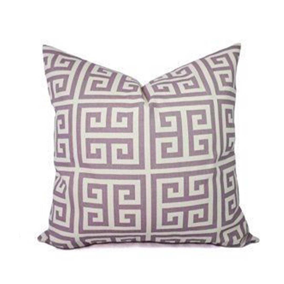 Mauve and cream cushion cover with a repeating maze pattern.