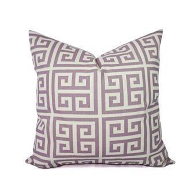Mauve and cream cushion cover with a repeating maze pattern.