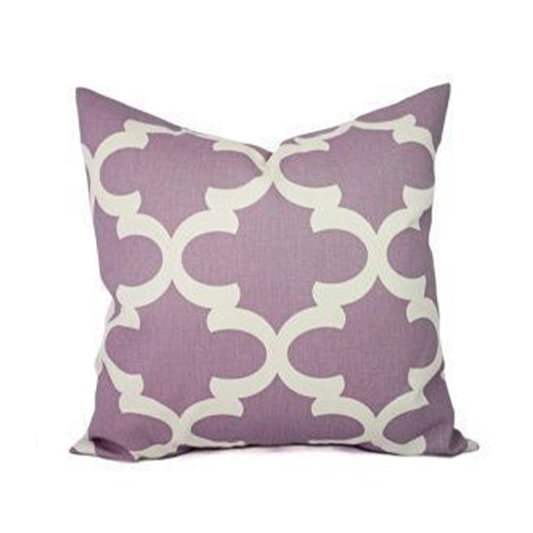 Mauve cushion cover with a cream interlocking circle pattern.