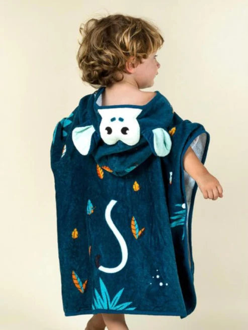 Back view of a navy jungle-animal towel poncho worn by a child.