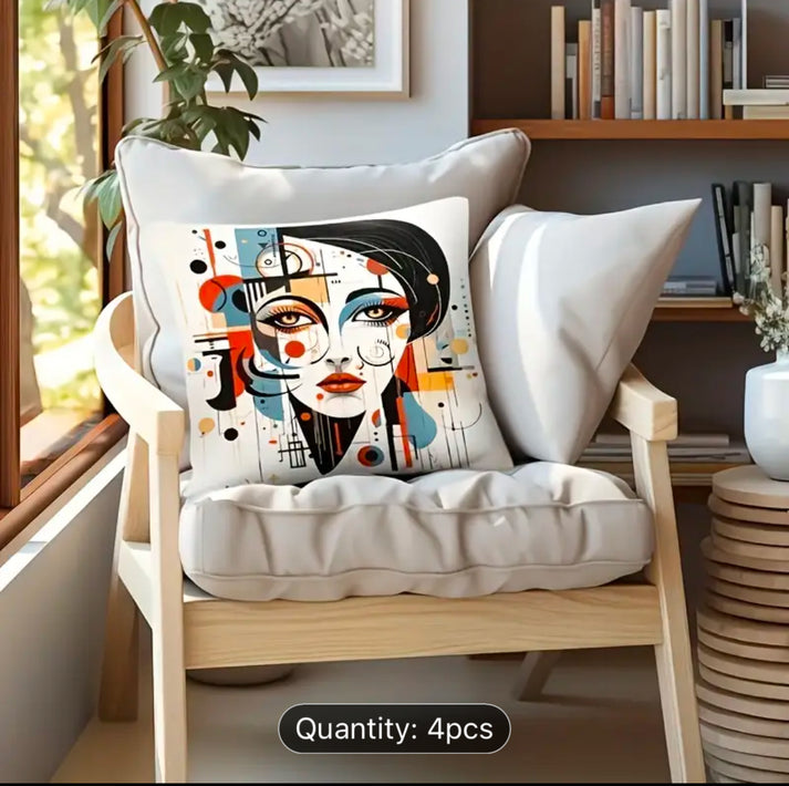Cushion cover with a woman's face in glasses and colourful abstract details on a wooden chair.