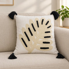 Minimal Leaf Embroidered Cushion Cover  placed on a sofa 