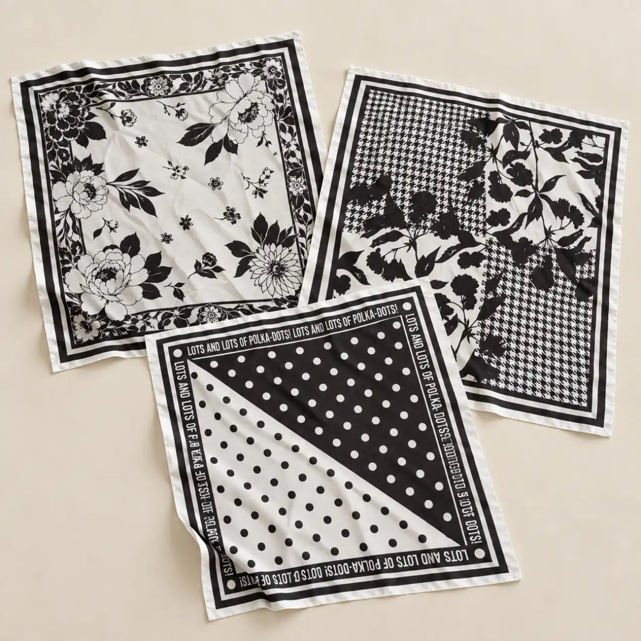 3 Norelle Bandana place on light beige surface 