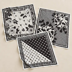 3 Norelle Bandana place on light beige surface 
