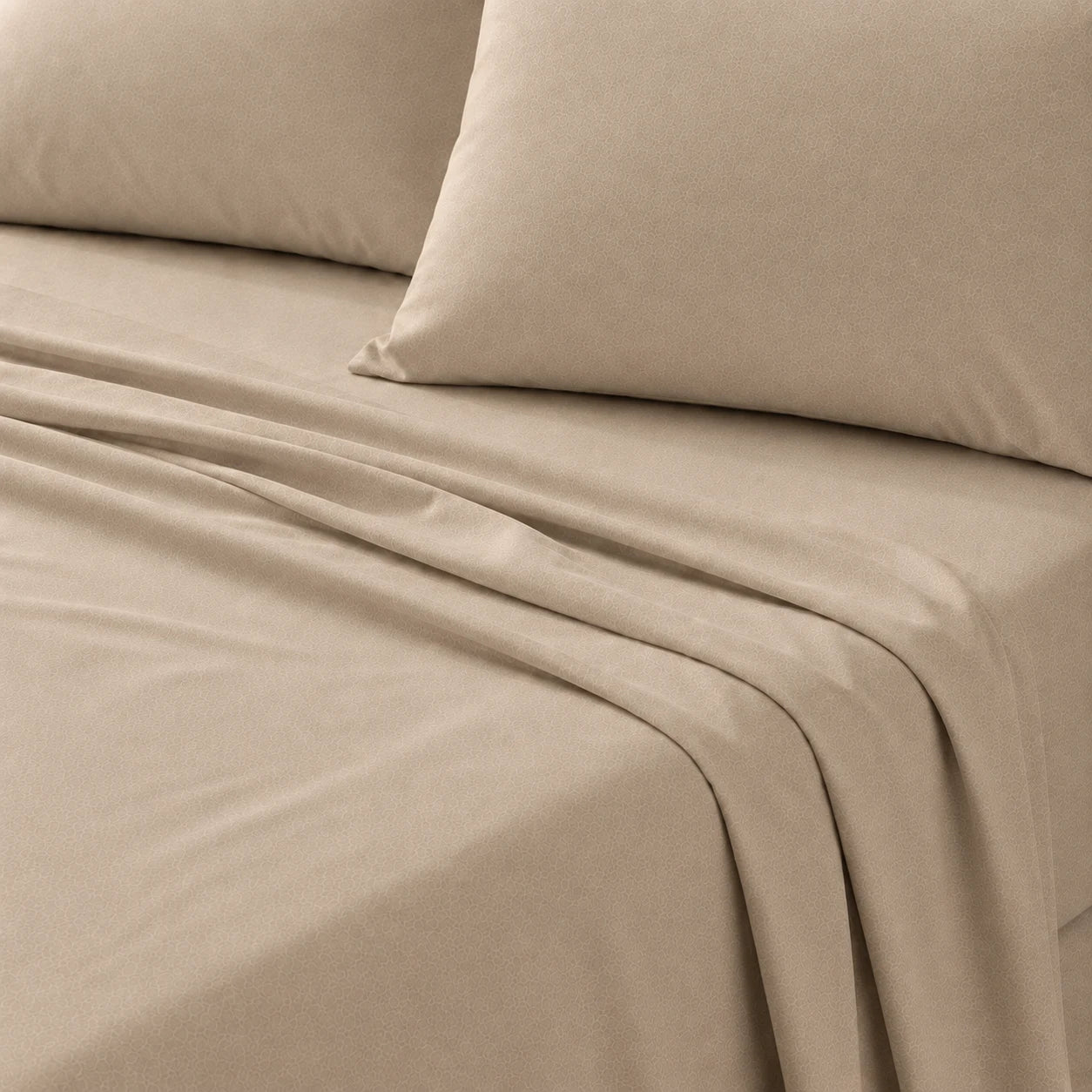 Plain Cotton Satin Bedsheet Light Tan With Pillows close up shot

