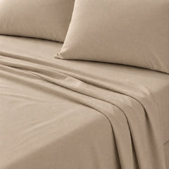 Plain Cotton Satin Bedsheet Light Tan With Pillows close up shot
