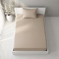 Plain Cotton Satin Bedsheet Set Sand Beige placed on bed 