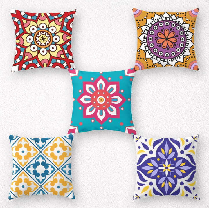 Five colourful cushion covers with mandala and geometric floral designs.