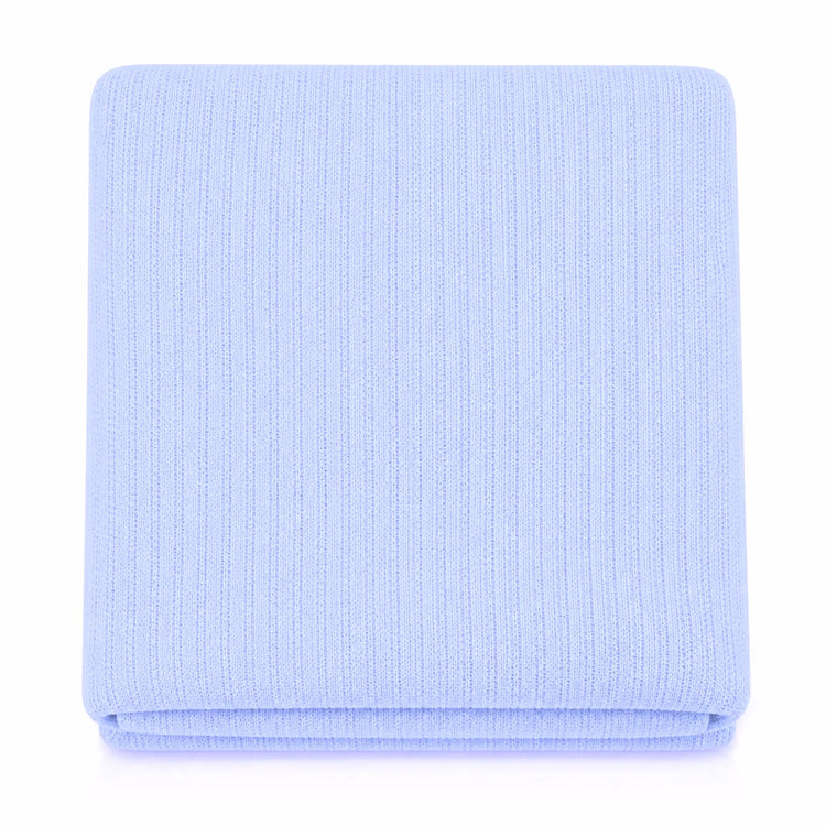 Folded light blue ribbed blanket viewed from above.