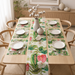 Green and pink tropical floral table runner with matching placemats.