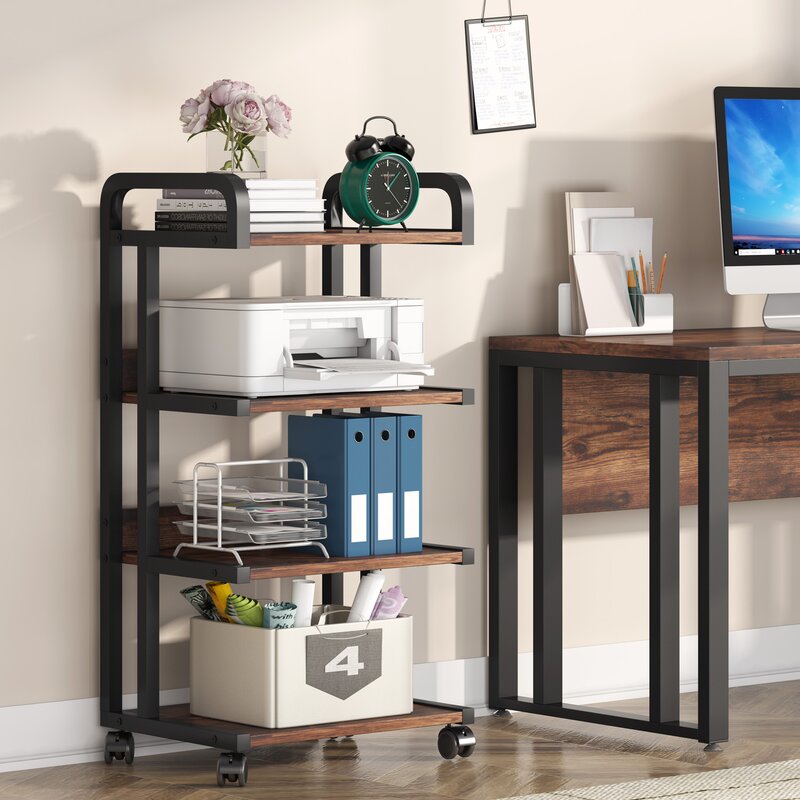 Four-tier rolling office rack holding a printer, folders and storage boxes beside a desk.