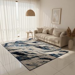Living room with a patterned rug, beige sofa, and decorative elements.