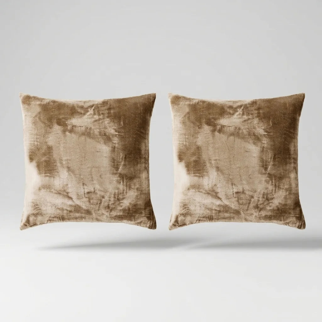 Vintage Velvet Cushion Covers floating on a light grey surface
