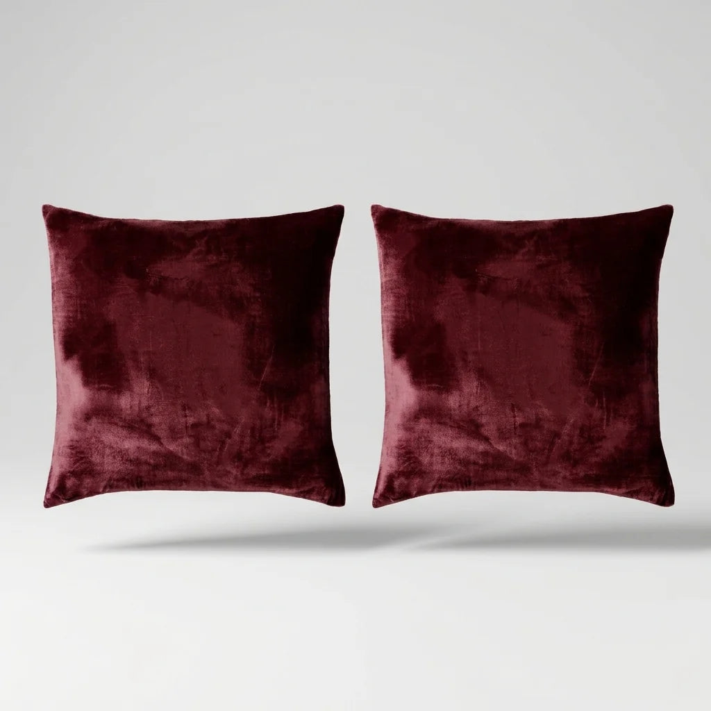 Vintage Velvet Cushion Covers floating on a light grey surface