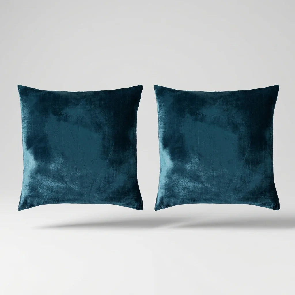 Vintage Velvet Cushion Covers floating on a light grey surface
