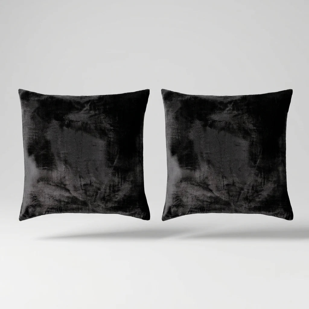 Vintage Velvet Cushion Covers floating on a light grey surface