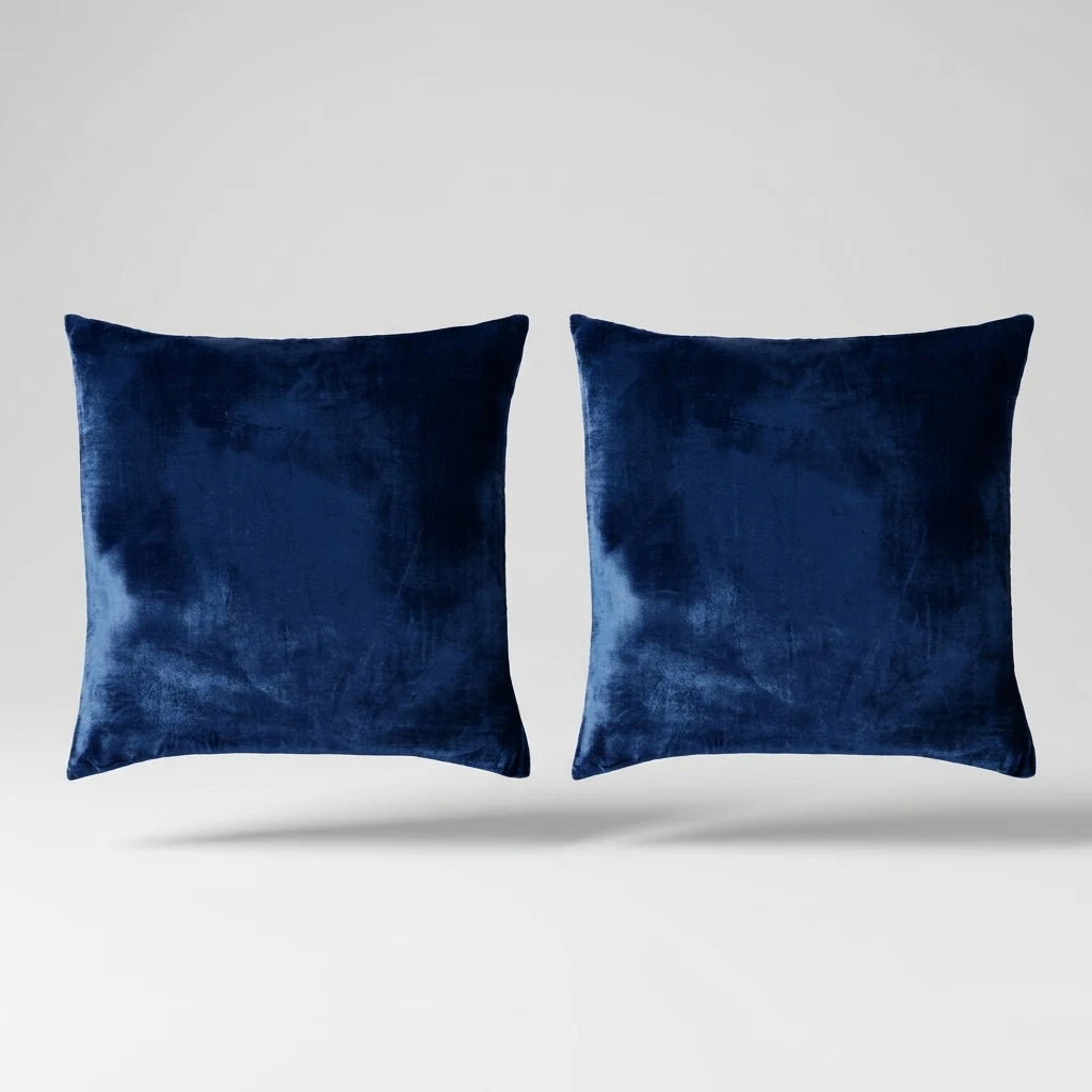 Vintage Velvet Cushion Covers floating on a light grey surface