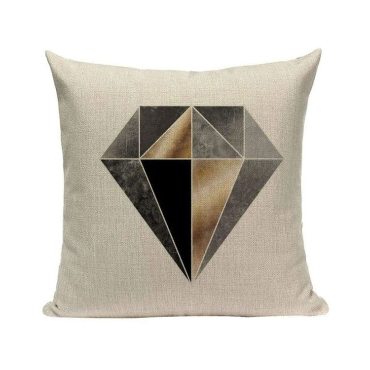 Cream cushion cover with a large black and bronze geometric diamond.