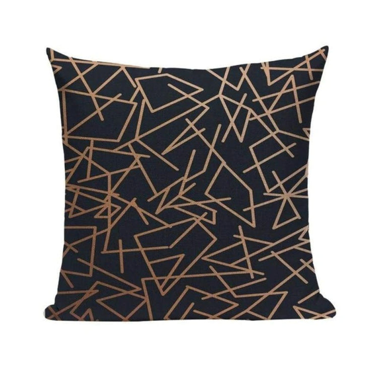 Dark cushion cover with fine bronze-coloured intersecting lines.