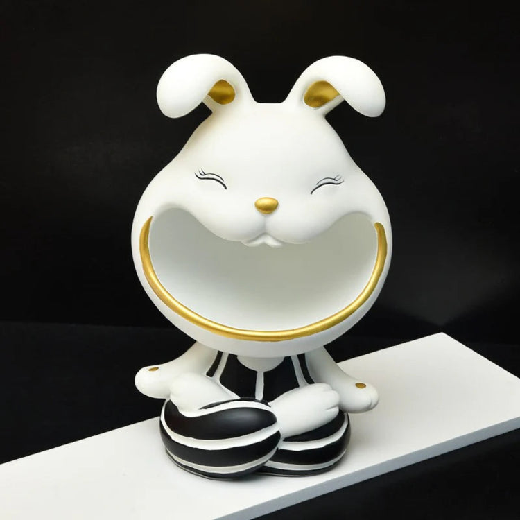 White rabbit-shaped decorative organizer with black shoes and gold-coloured trim.