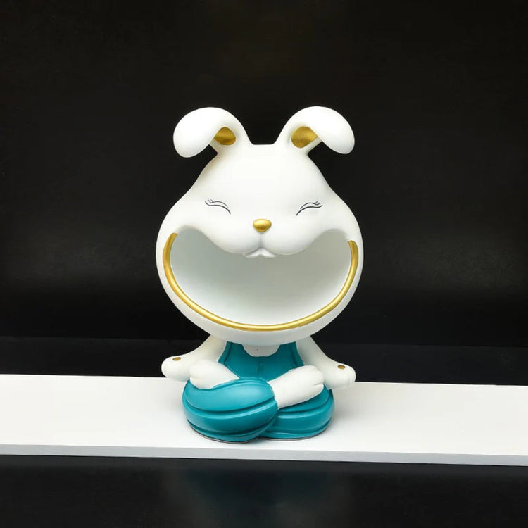 White rabbit-shaped decorative organizer with teal shoes.