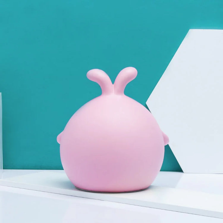Back view of a pink rabbit-shaped organizer.