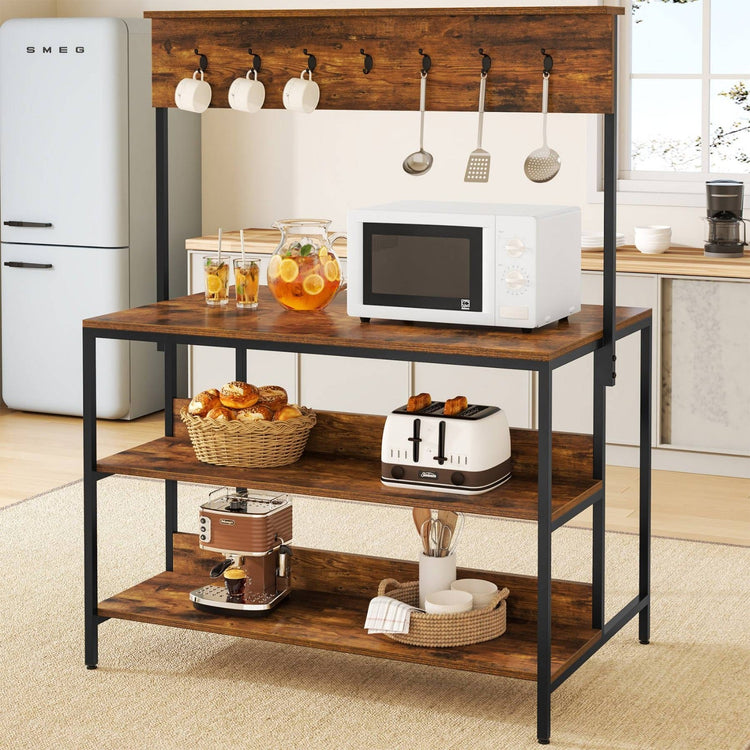 Brown-shelf kitchen rack with a black frame and raised wooden hook rail holding appliances, cookware and utensils.
