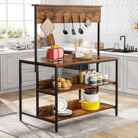 Brown-shelf kitchen rack with a black frame and raised wooden hook rail holding appliances, cookware and utensils.