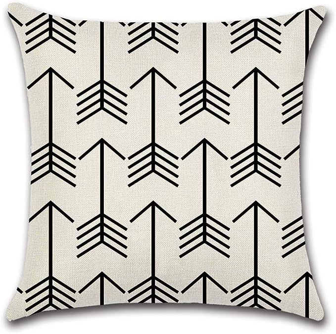 Cream cushion cover with vertical rows of thin black arrows.