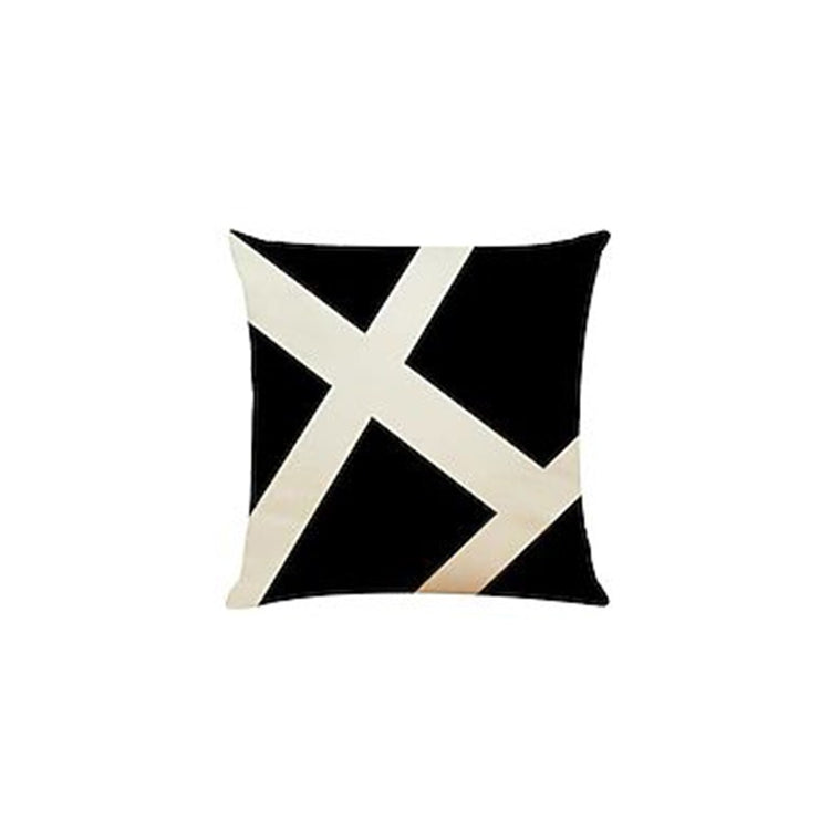 Black cushion cover with broad intersecting cream diagonal lines.