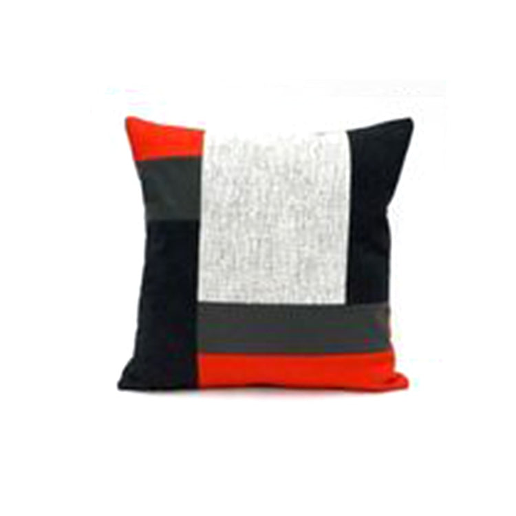 Black cushion cover with grey and white rectangular panels and narrow red bands.