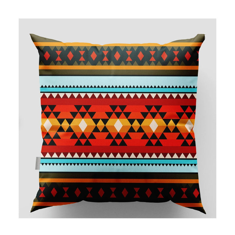 Cushion cover with orange, red, teal and black geometric stripes and triangles.