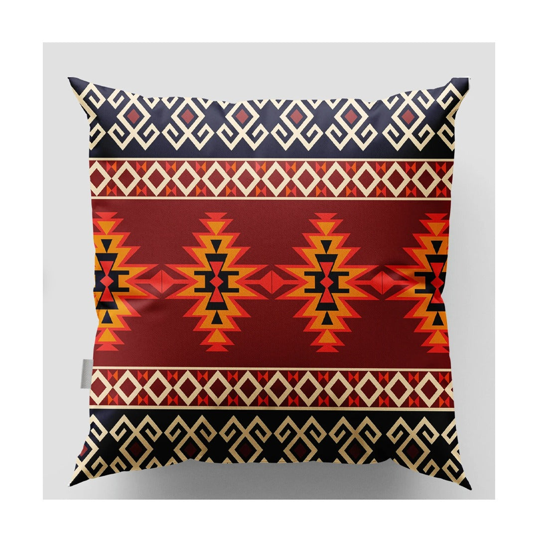 Cushion cover with an orange centre of stepped motifs and black and cream patterned borders.