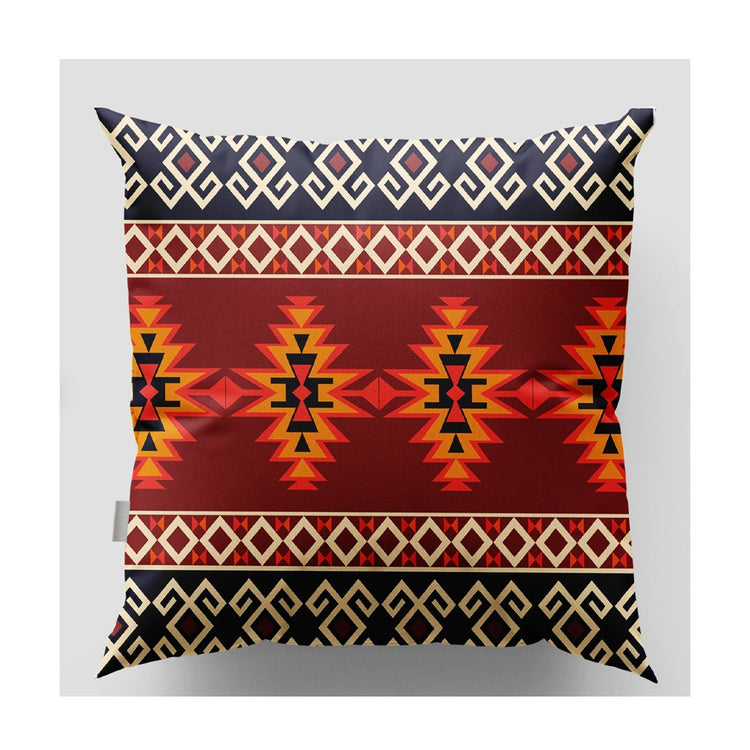 Cushion cover with an orange centre of stepped motifs and black and cream patterned borders.