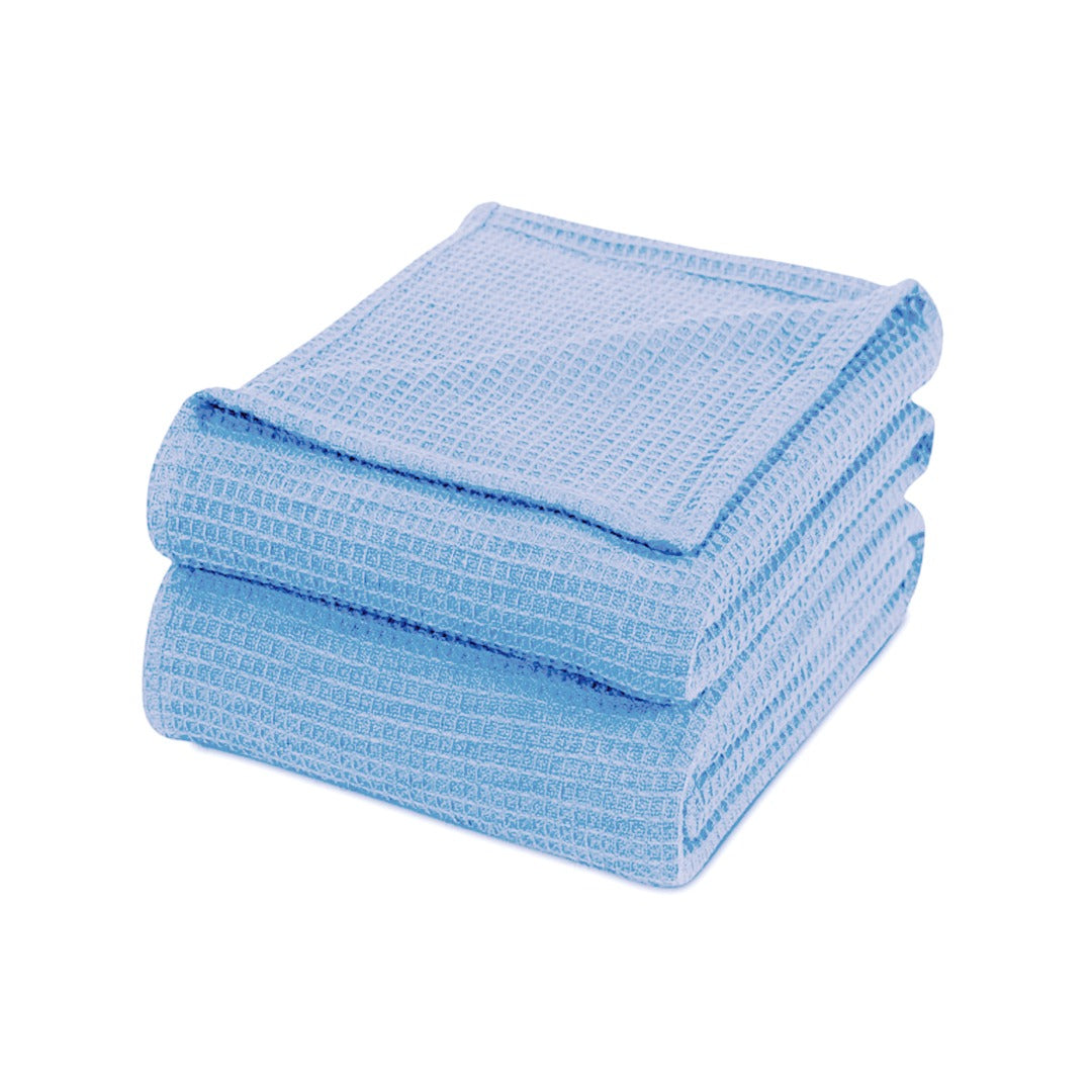 Folded light blue waffle-weave cotton thermal blanket.