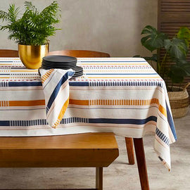Cream tablecloth with navy and mustard horizontal stripes.