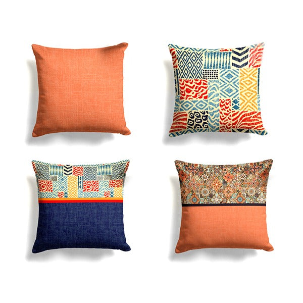 Four cushion covers with orange and navy panels and colourful patchwork patterns.