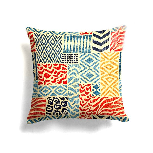 Cushion cover with multicoloured geometric patchwork squares.