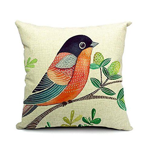 Cream cushion cover with a blue and orange bird perched on a leafy branch.
