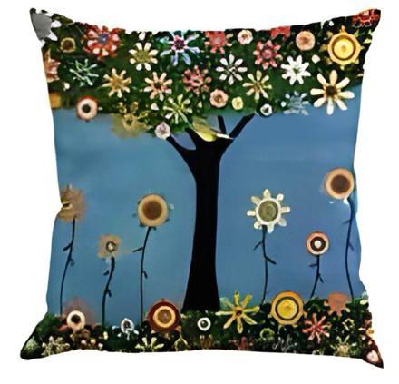 Blue cushion cover with a dark tree canopy filled with colourful flowers.