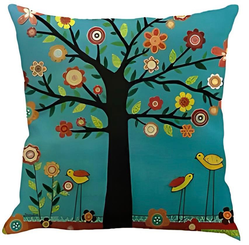 Teal cushion cover with a black tree and colourful flower-shaped leaves.