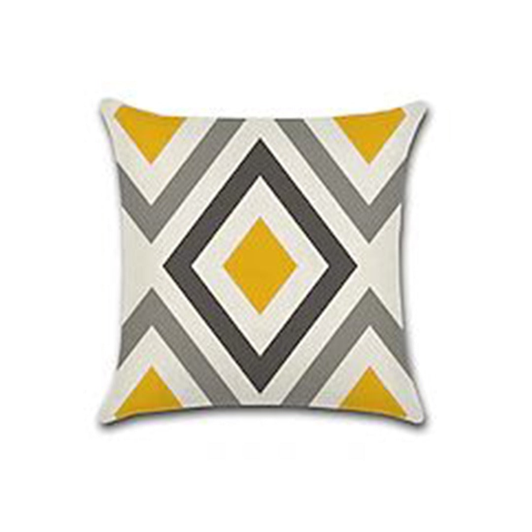 Cushion cover with nested grey and white diamonds and mustard accents.