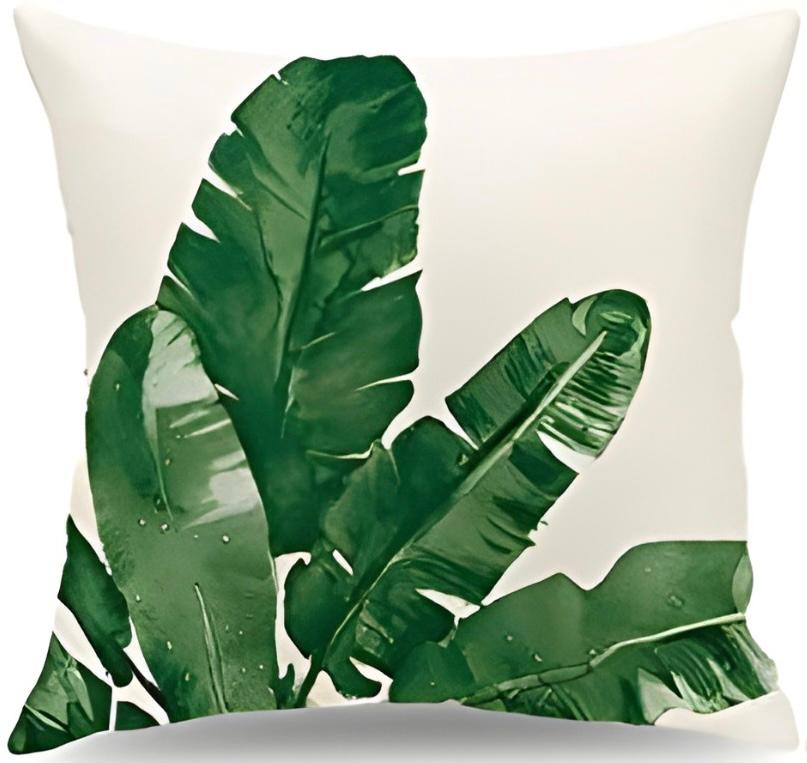 Cream cushion cover with a cluster of broad green banana leaves.