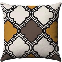 Cushion cover with mustard, grey and white quatrefoil shapes outlined in black.