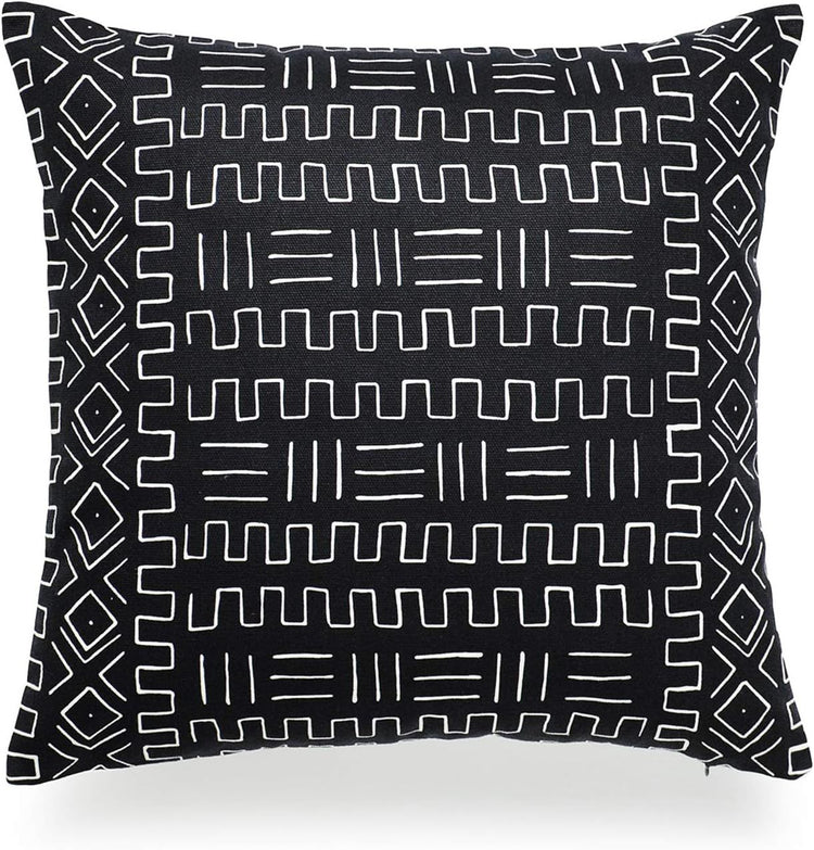 Black cushion cover with fine white angular lines and geometric borders.