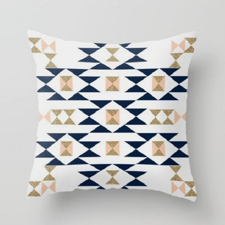Cream cushion cover with navy and beige geometric diamonds and triangles.