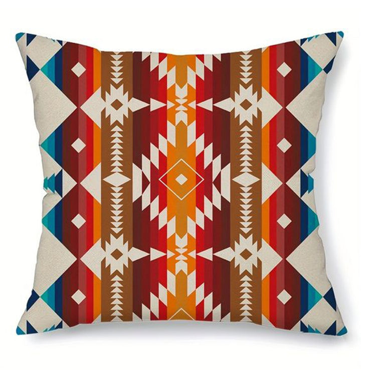 Cushion cover with rust vertical bands and small cream and teal geometric motifs.