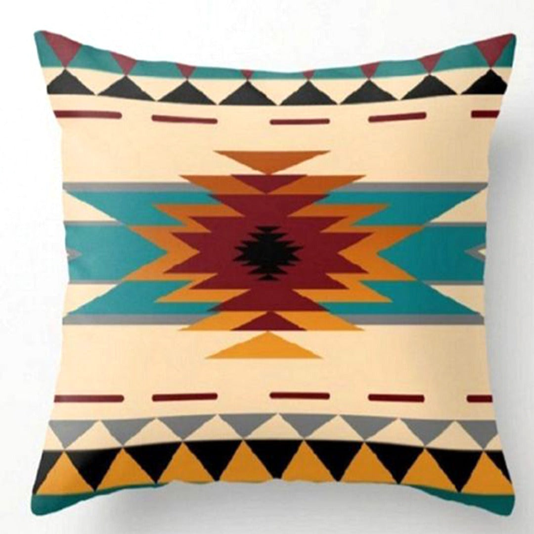 Cream cushion cover with a large multicoloured stepped diamond and geometric borders.