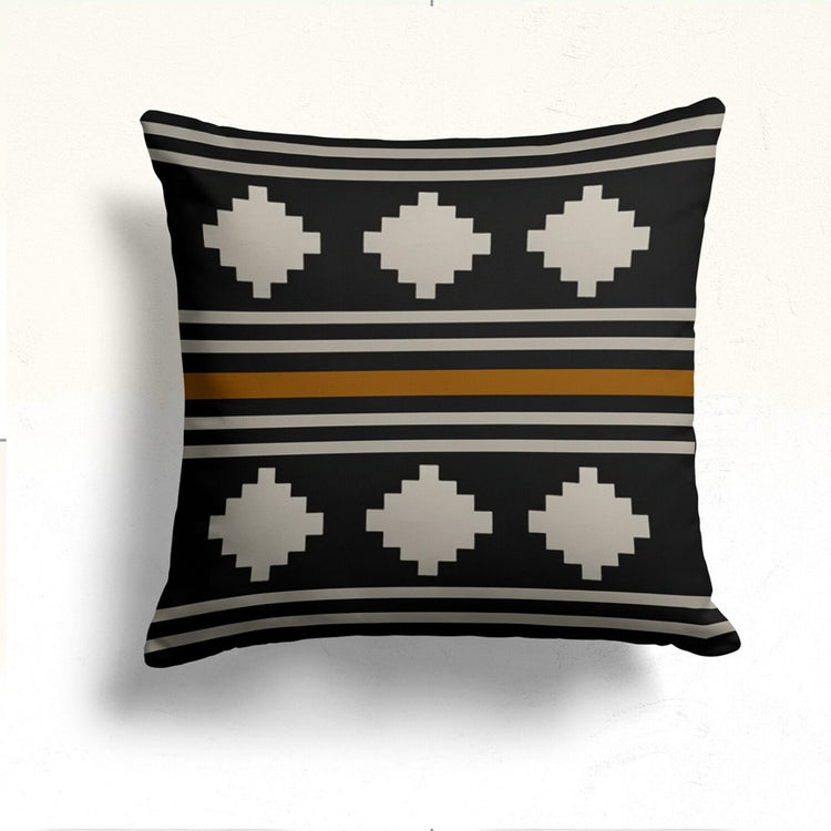 Black cushion cover with cream diamonds and narrow cream and mustard horizontal stripes.