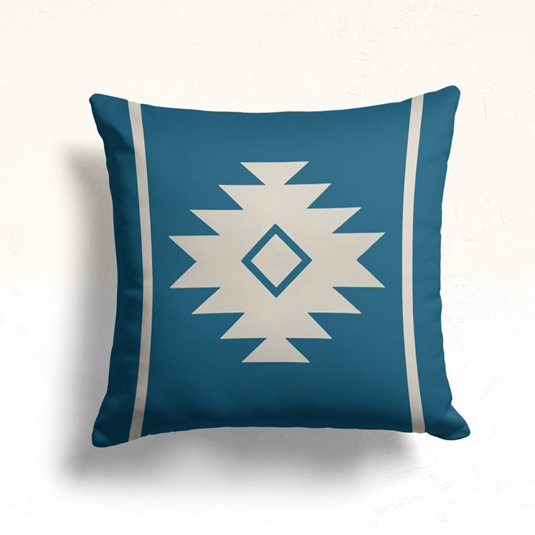 Teal cushion cover with a cream stepped diamond and two narrow side stripes.